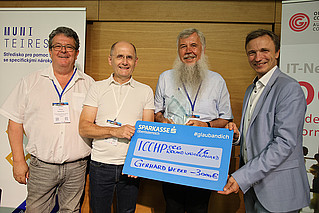 Übergabe des Roland Wagner Preises (Klaus Höckner (hilfsgemeinschaft der Blinden und Sehschwachen), Klaus Miesenberger (JKU), Gerhard Weber (TU Dresden), Roland Bieber (OCG)Gerhard Weber während der ICCHP 2026 Das Bild zeigt Prof. Dr. Gerhard Weber zusammen mit Klaus Höckner, Klaus Miesenberger, Gerhard Weber, Roland Bieber während der Abschlussveranstaltung der ICCHP 2026.